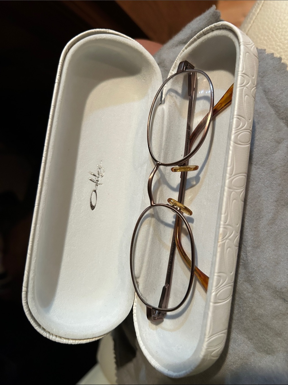 Oakley Men’s Brown Oval Metal Frame Glasses with Amber Temples